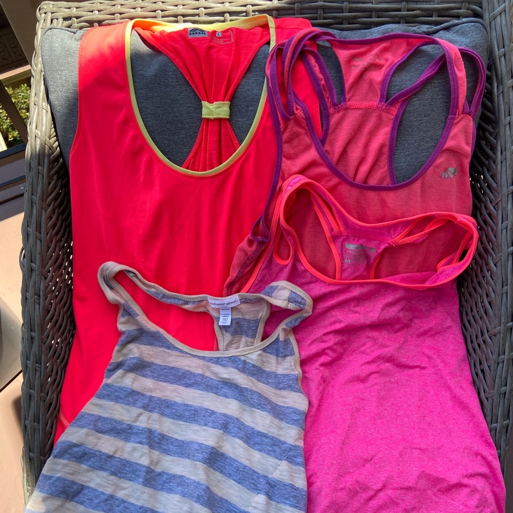 Batch of worn & unworn gym tank tops various sizes